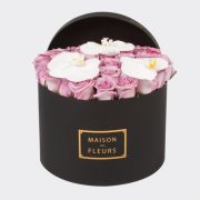 Fresh Purple Roses and Orchids in a Black Round Box