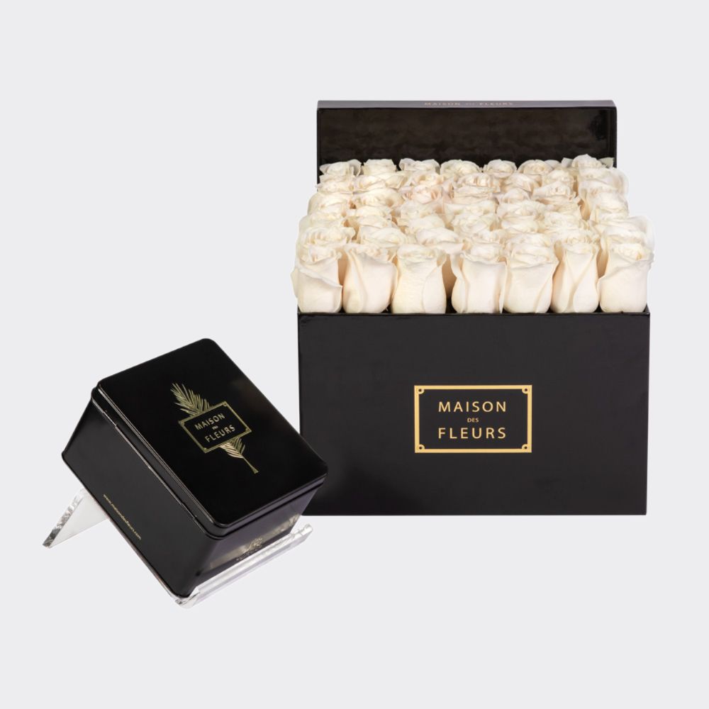 Gift set of luscious cream roses in a 30 cm black square box with a large premium Medjool dates box