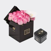 Gift set of a pink roses with a single orchid bloom in a square 15 cm black box with a small Medjool dates box