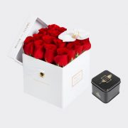 Gift set of red roses with a single orchid bloom in a square 15 cm white box with a small Medjool dates box.