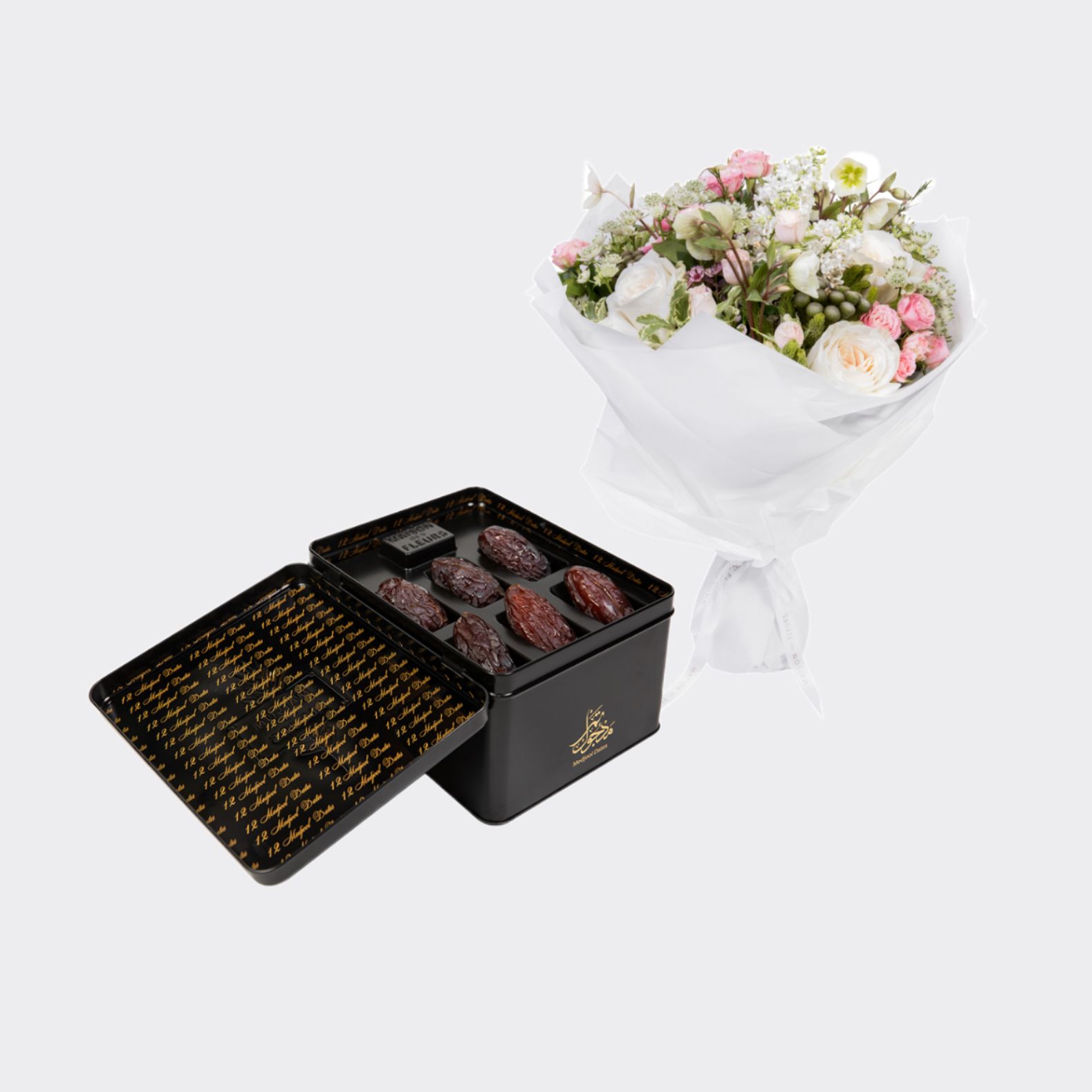 gift set of a bouquet of mixed fresh flowers, with a large Medjool dates box