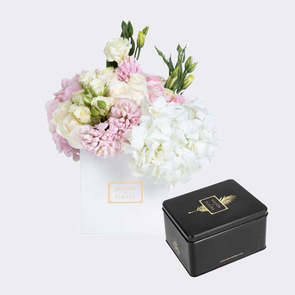Gift set of a mixed fresh flowers in a white 15 cm square box, with a large box of Medjool dates
