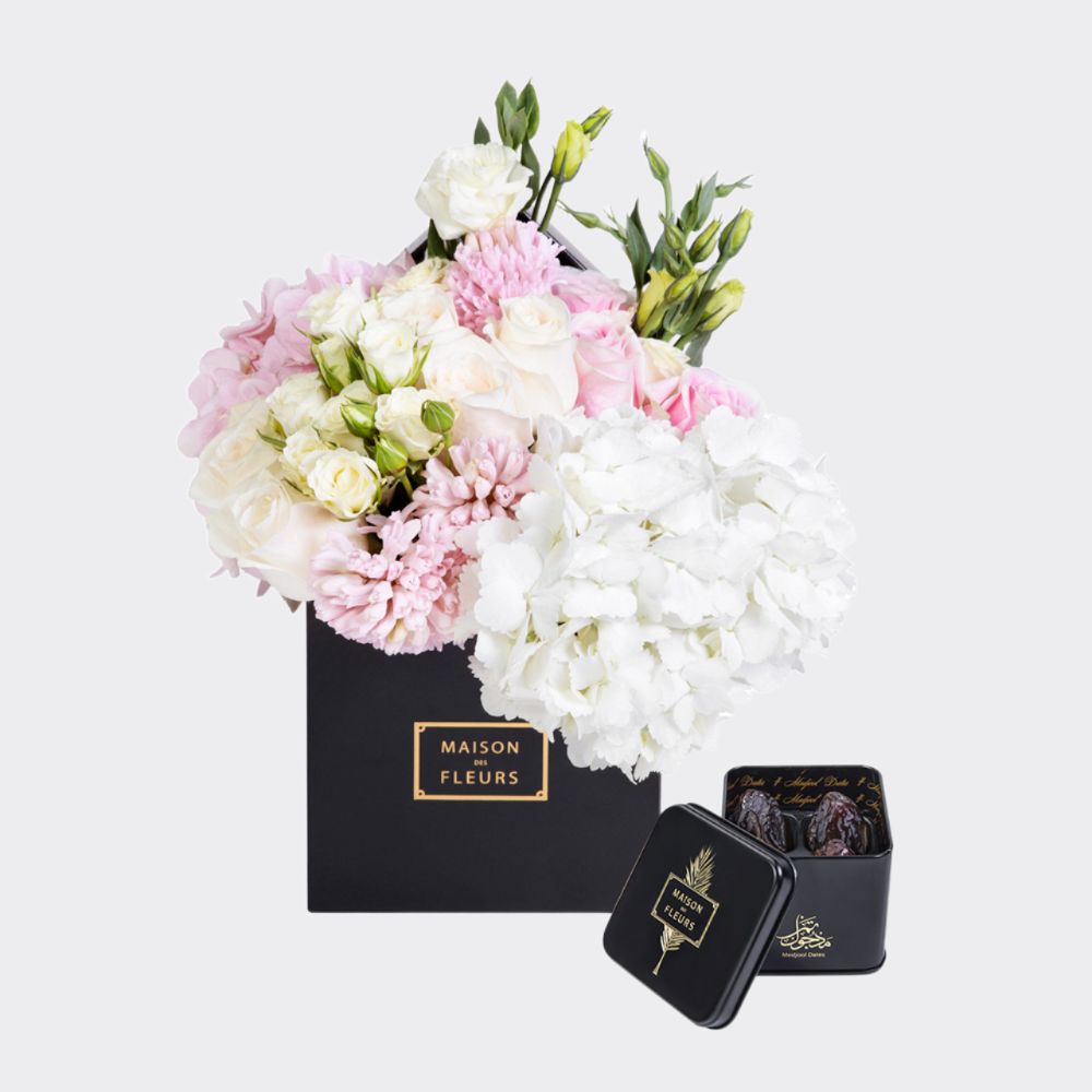 Gift set of mixed fresh flowers in a black 15 cm square box, with a small Medjool dates box.