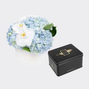 Gift set of fresh blue Hydrangeas with 2 orchid blooms in a White 20 cm round box, coupled with a large box of premium Medjool dates