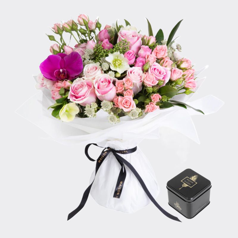 gift set of a beautiful mixed pink fresh flowers bouquet and small Medjool dates box